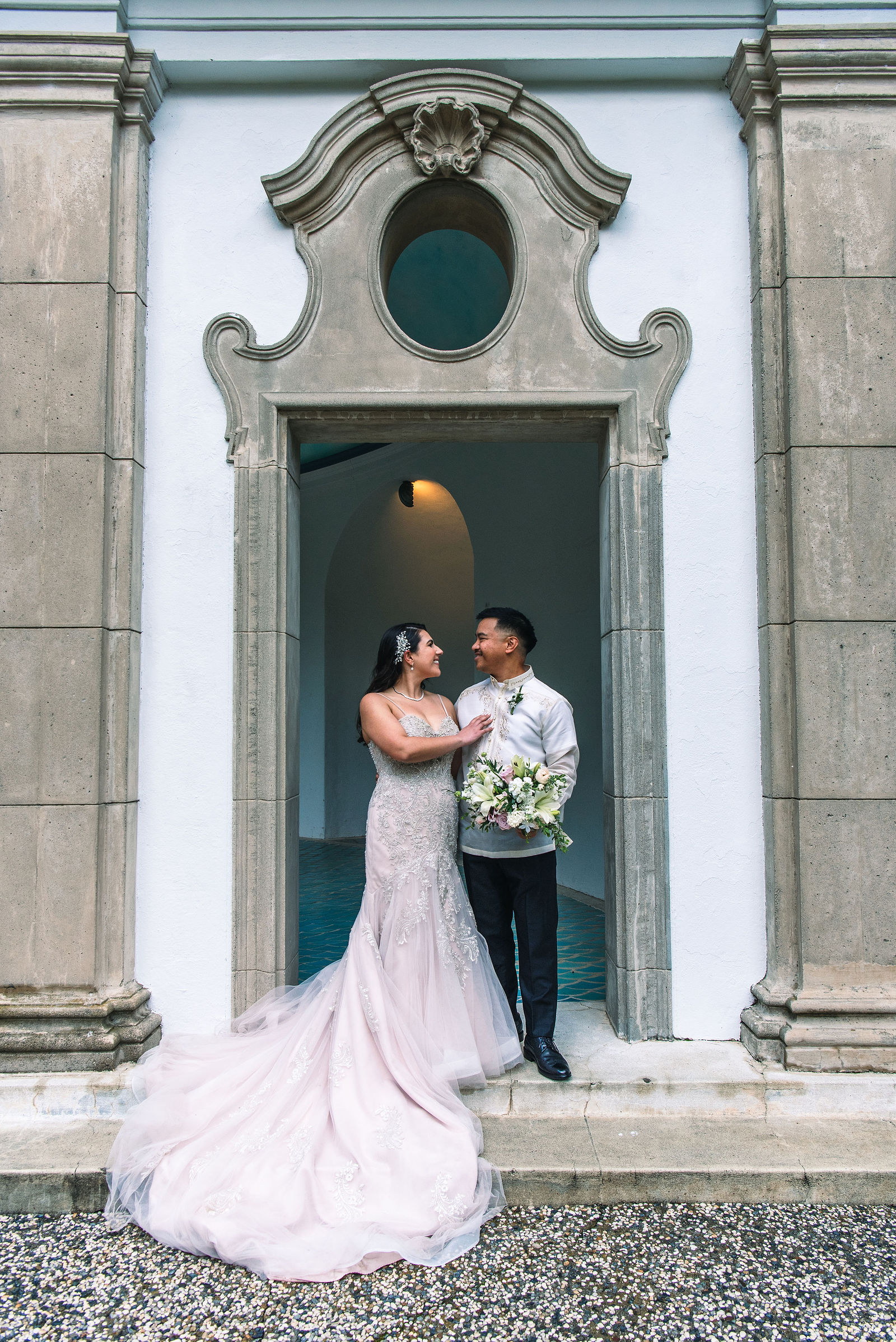 newlywed couple staring at each other 